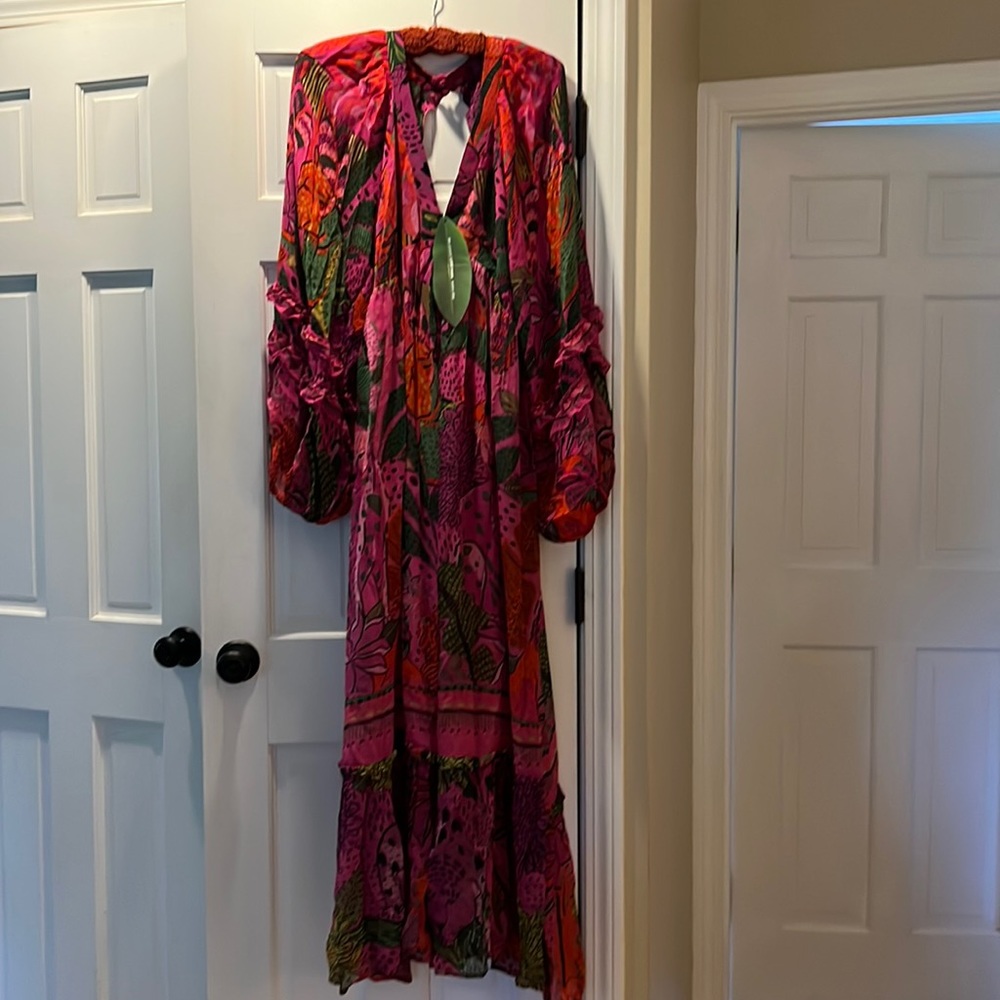 Never worn. Beautiful animal print maxi dress.